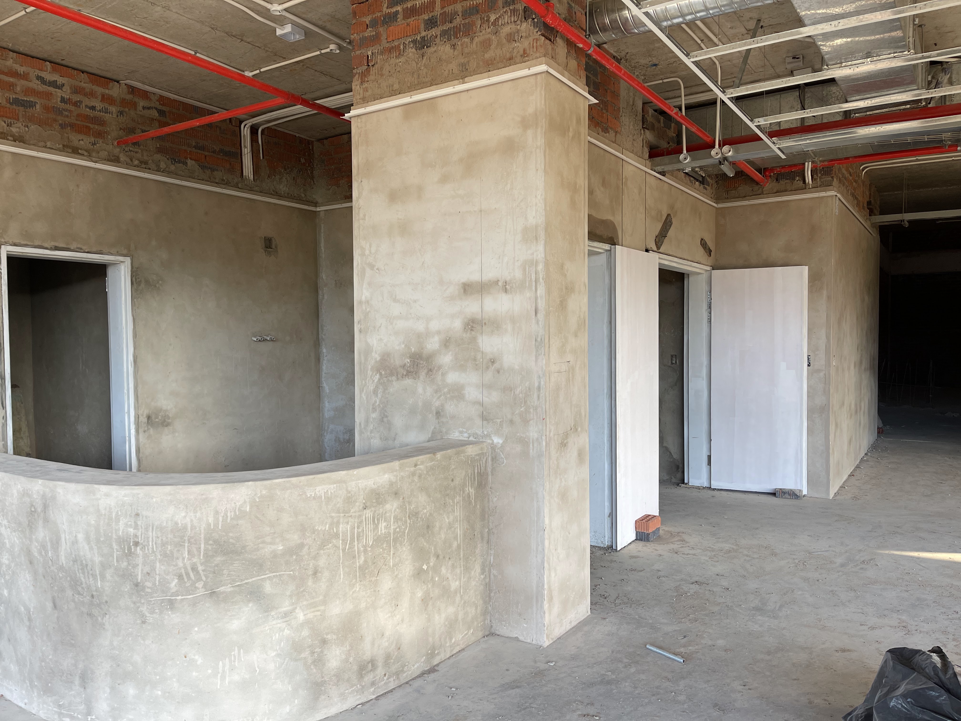 Lenda Construction team member plastering RDP house